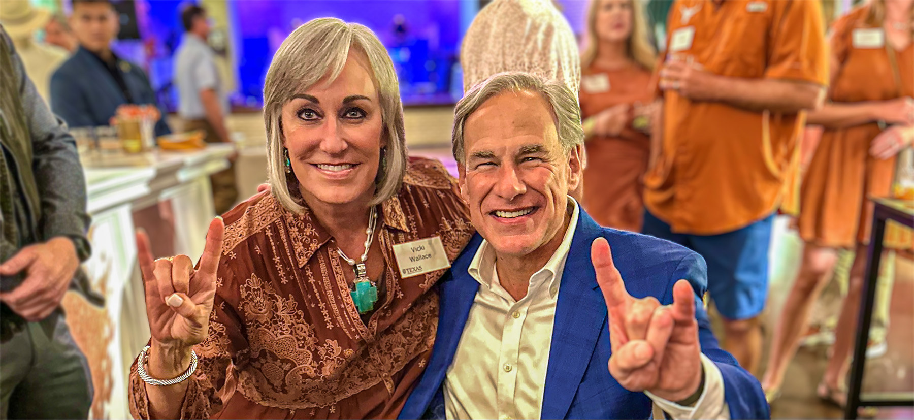 Vicki Wallace with Texas Governor Greg Abbott.